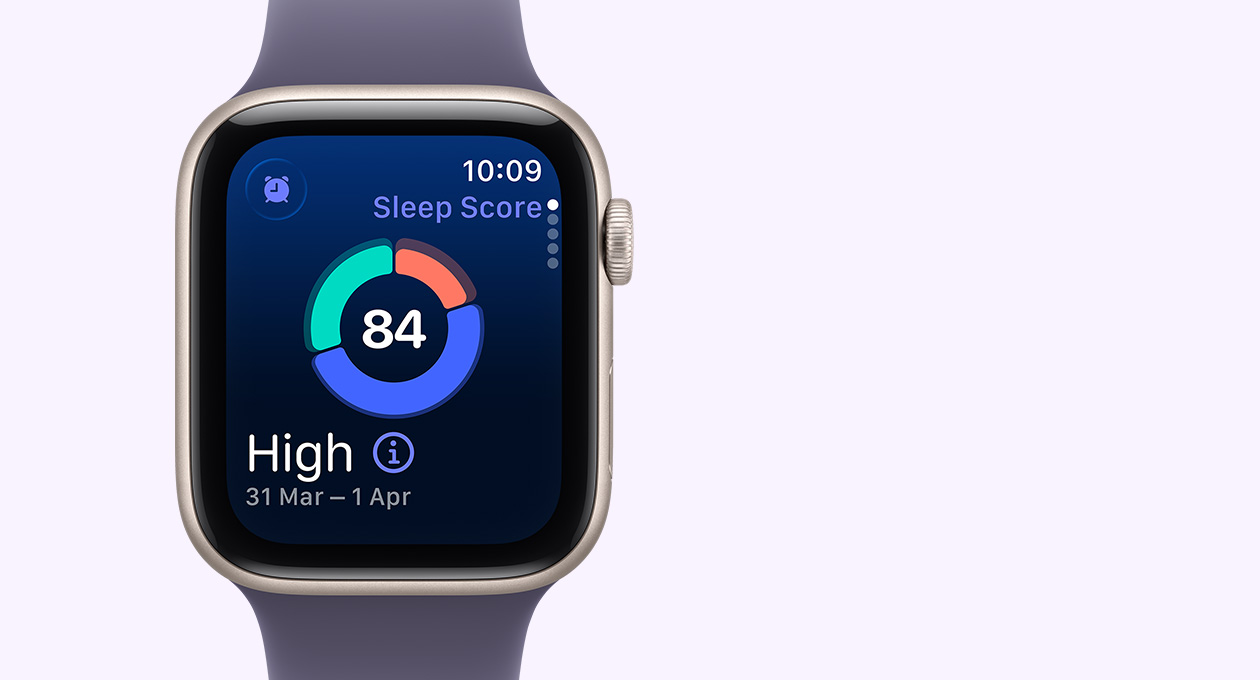 Apple Watch SE 3, aluminium case, starlight colour, screen shows sleep score circle graph, right side exterior, Digital Crown, Sport Band, purple fog colour