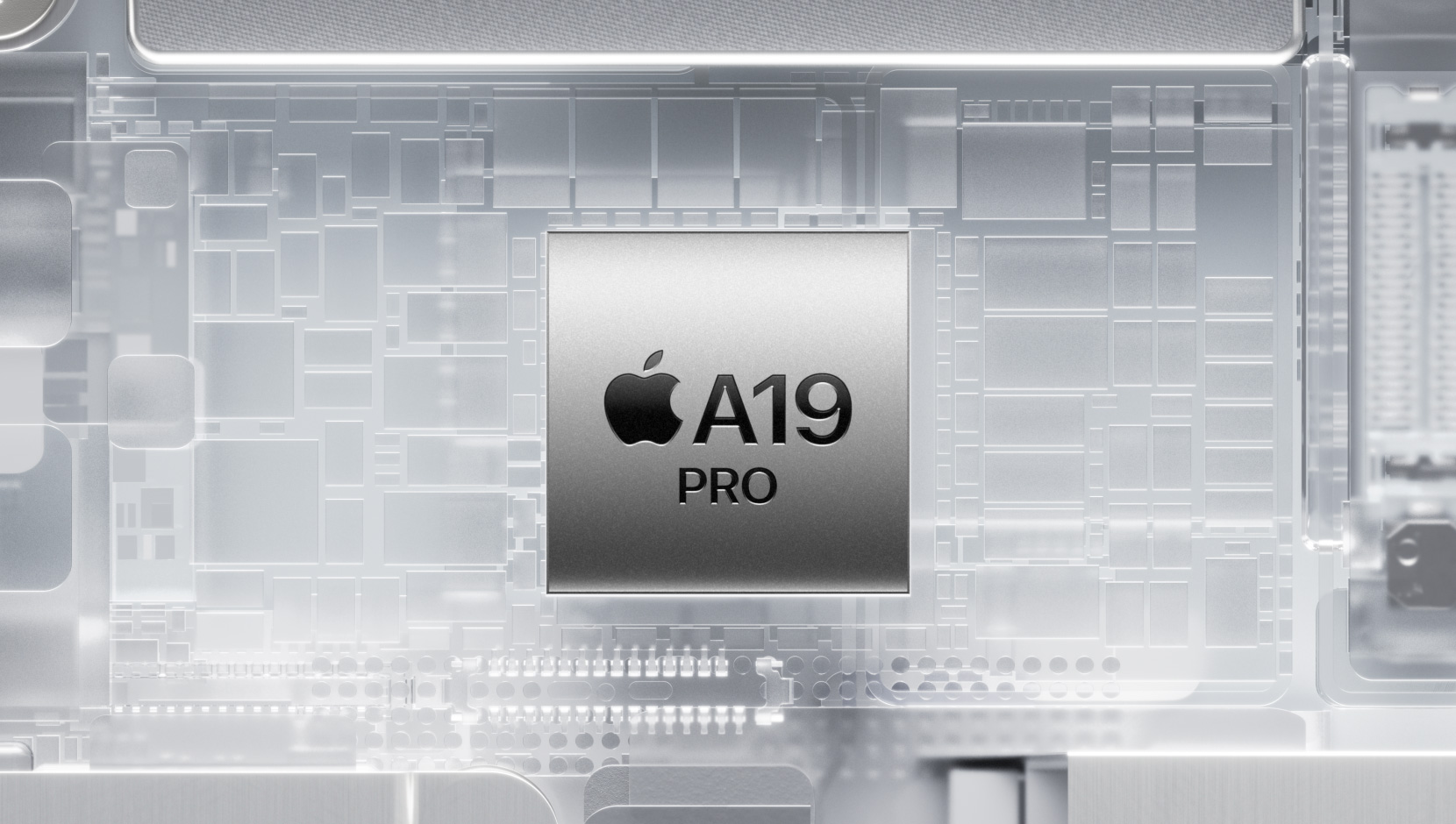 A19 Pro kiip ümbritsetud iPhone’i valgustatud sisekomponentidest